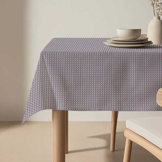 Tablecloth with geometric pattern on a table in a minimalistic room